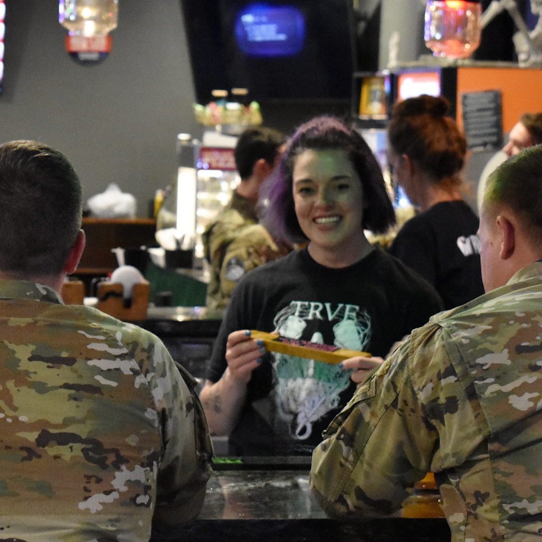 Bartender at the Colorado Pizza, located in the Peterson SFB Hub